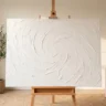 A beginner-friendly textured canvas with soft swirling white palette-knife texture, standing on a simple wooden easel